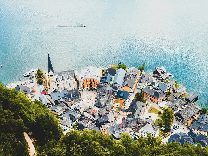 The village from above: a church spire, the square and the roofs on the lakeshore